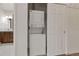 Stackable washer and dryer in a closet at 1000 E 1St Ave # 405, Denver, CO 80218