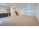 Finished basement with wet bar, carpeting, and plenty of space for recreation at 14560 N Navajo Ct, Broomfield, CO 80023