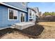 Small backyard with patio, landscaping and a view of the house at 6140 E 121St Dr, Brighton, CO 80602