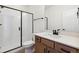 Modern bathroom with a large shower and updated vanity at 8389 Butte Creek St, Littleton, CO 80125