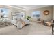 Main bedroom with neutral decor and plenty of natural light at 12653 Fisher Dr, Englewood, CO 80112