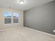 Well-lit bedroom with neutral wall colors and carpet flooring at 12653 Fisher Dr, Englewood, CO 80112