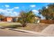 Ranch home with a freshly landscaped yard and driveway at 7956 Joan Dr, Denver, CO 80221