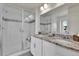 Bathroom with granite countertop and shower at 3406 Emily St, Castle Rock, CO 80109