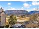 Scenic view of mountain range and park-like setting at 7409 S Alkire St # 305, Littleton, CO 80127