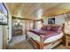 Spacious bedroom with wooden furniture and large bed at 85 Revett Dr # 73, Breckenridge, CO 80424