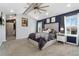 Spacious main bedroom with walk-in closet and large windows at 5863 S Gray St, Littleton, CO 80123