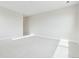 Bright bedroom with light carpet and access to a hallway at 5566 Hickory Oaks Trl, Castle Rock, CO 80104