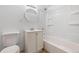 Updated bathroom with a tub, shower, and vanity at 4455 S Delaware St, Englewood, CO 80110