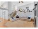 Bright living room with high ceilings, fireplace and hardwood floors at 17043 Hastings Ave, Parker, CO 80134