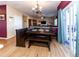 Breakfast nook with built-in bench seating and view into Gathering room at 5705 Palmer Dr, Castle Rock, CO 80104