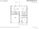First floor plan showcasing kitchen, living room, and two-car garage at 924 Sunflower St, Louisville, CO 80027