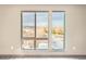Bedroom window view overlooking neighborhood and distant mountains at 12983 W Ida Ave # 310, Littleton, CO 80127
