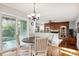 Kitchen breakfast nook with access to the backyard patio at 5627 S Idalia St, Centennial, CO 80015