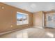 Living room with hardwood floors and plenty of natural light at 5552 Flanders Way, Denver, CO 80249