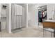 Bathroom with shower, closet, and vanity at 5552 Flanders Way, Denver, CO 80249