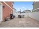 Patio area with table, chairs, and grill at 5552 Flanders Way, Denver, CO 80249