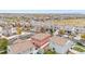 Aerial view of a quiet residential neighborhood with houses and a park at 5552 Flanders Way, Denver, CO 80249