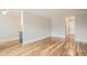 Spacious living area featuring hardwood floors and neutral walls at 969 S Pearl St # 204, Denver, CO 80209