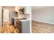 Modern kitchen with stainless steel appliances and white cabinets at 969 S Pearl St # 204, Denver, CO 80209
