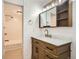Updated bathroom with a new vanity and stylish fixtures at 969 S Pearl St # 204, Denver, CO 80209