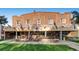 Brick building with large windows and outdoor seating at 969 S Pearl St # 204, Denver, CO 80209