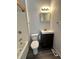 Clean bathroom with vanity, toilet and bathtub at 17136 E Tennessee Dr, Aurora, CO 80017