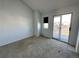 Spacious bedroom featuring a private balcony at 17136 E Tennessee Dr, Aurora, CO 80017
