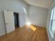 Well-lit bedroom with hardwood floors and ample space at 17136 E Tennessee Dr, Aurora, CO 80017