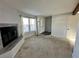 Living room with fireplace and view of entryway at 17136 E Tennessee Dr, Aurora, CO 80017