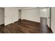 Finished basement with laminate floors and large closets at 8311 Ogden St, Denver, CO 80229