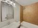 Bathroom with updated vanity and tiled shower/tub at 8311 Ogden St, Denver, CO 80229