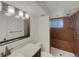 Basement bathroom with shower and vanity at 8311 Ogden St, Denver, CO 80229