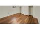 Simple bedroom with hardwood floors and closet at 8311 Ogden St, Denver, CO 80229