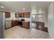 Kitchen with stainless steel appliances and granite countertops at 8311 Ogden St, Denver, CO 80229