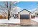 House exterior showcasing a two-car garage and front yard at 2206 E 97Th Ave, Thornton, CO 80229