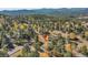 Home situated in a wooded mountain community at 1359 Pomegranate Ln, Golden, CO 80401