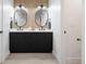 Contemporary bathroom with double vanity and wood-look wall tiles at 1231 Perry St # 2, Denver, CO 80204