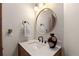 Chic bathroom boasts a modern vanity, elegant mirror, and updated fixtures at 175 Harrison St, Denver, CO 80206