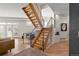 Stunning staircase with modern metal railing and light wood steps at 175 Harrison St, Denver, CO 80206