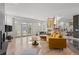 Spacious living area with hardwood floors, fireplace and access to backyard at 175 Harrison St, Denver, CO 80206