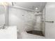 Basement bathroom with marble tile shower and modern fixtures at 175 Harrison St, Denver, CO 80206