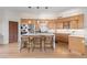 Updated kitchen featuring light wood cabinetry, stainless steel appliances and island at 175 Harrison St, Denver, CO 80206