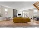 Bright living room features hardwood floors, a fireplace, and large windows at 175 Harrison St, Denver, CO 80206