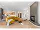 Open living room showcasing hardwood floors and a modern fireplace at 175 Harrison St, Denver, CO 80206