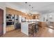 Bright kitchen featuring stainless steel appliances and a large island at 175 Harrison St, Denver, CO 80206
