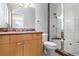 Elegant bathroom with granite countertops, a shower, and a toilet at 175 Harrison St, Denver, CO 80206