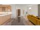 Elegant entryway with granite flooring and views into the living room and kitchen at 175 Harrison St, Denver, CO 80206
