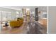 Bright living room with hardwood floors, fireplace and large windows at 175 Harrison St, Denver, CO 80206
