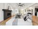 Bright living room with fireplace and comfortable seating at 2504 Zenobia St, Denver, CO 80212